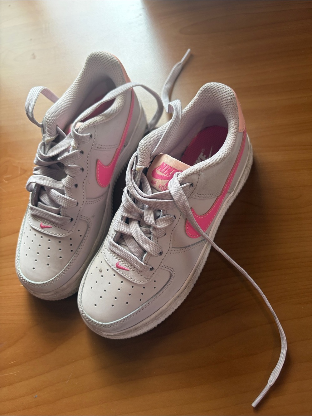 Nike Kids White Sneakers with Pink Swoosh